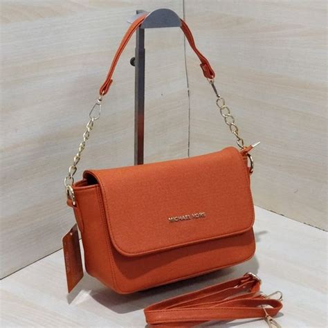 michael kors orange sling bag